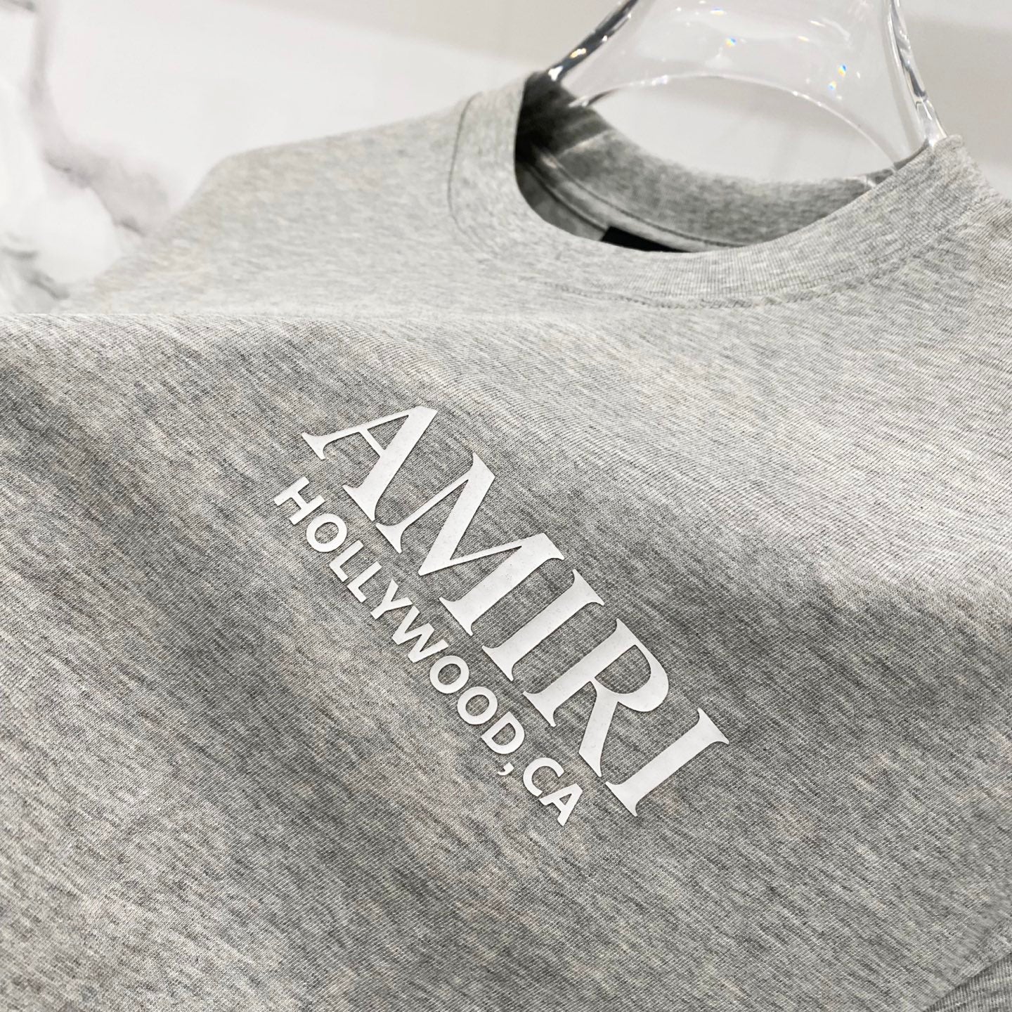 Heather gray Amiri T-shirt with HOLLYWOOD CALIFORNIA text graphic