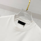 White crewneck T-shirt neck area with black woven label
