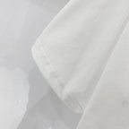 White T-shirt sleeve and side hem with visible stitching