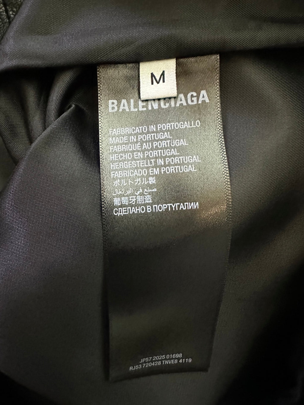 Balenciaga long coat size M care label on interior lining, dark fabric