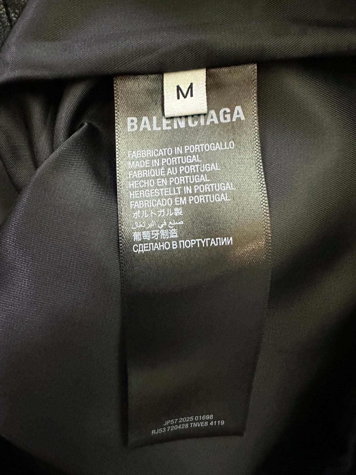 Balenciaga long coat size M care label on interior lining, dark fabric