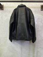 Balenciaga long coat in dark leather-look, back view with curved seam details
