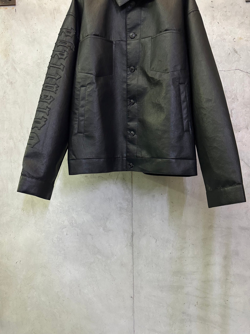 Balenciaga long coat in dark leather-look with pointed collar and embossed sleeve lettering
