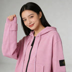 Stone Island pink zip-up hoodie with hood drawstrings and sleeve patch
