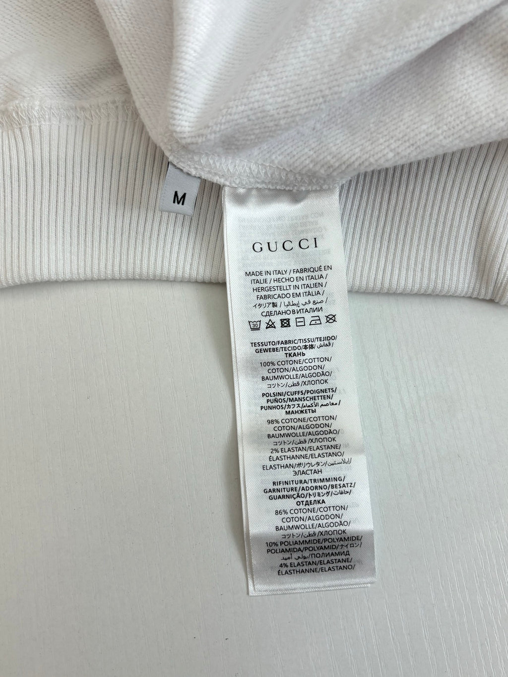 Long clothing garment with Gucci label and size M