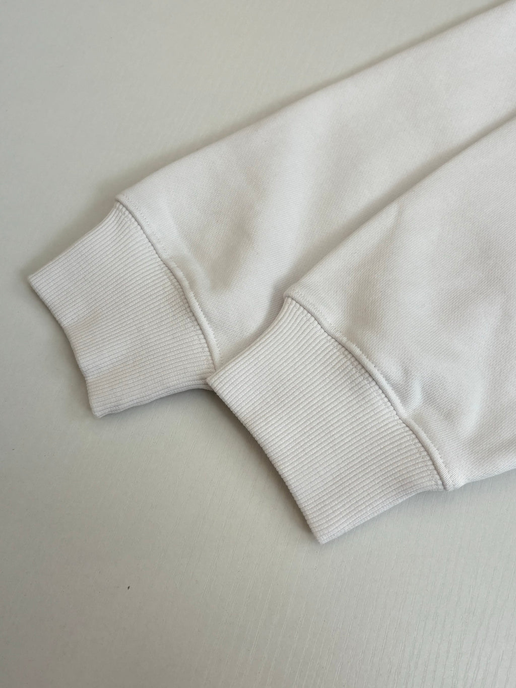 Gucci white hoodie knit cuffs with ribbed texture
