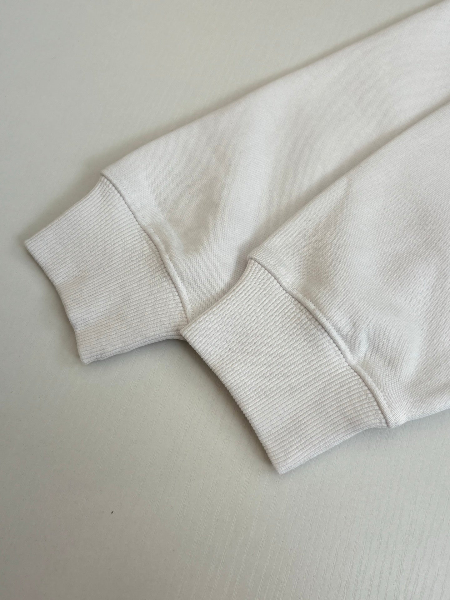 Gucci white hoodie knit cuffs with ribbed texture