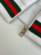 Gucci white zip hoodie with striped knit bands and silver zipper details