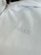 Gucci white hoodie fabric with small embossed Gucci logo