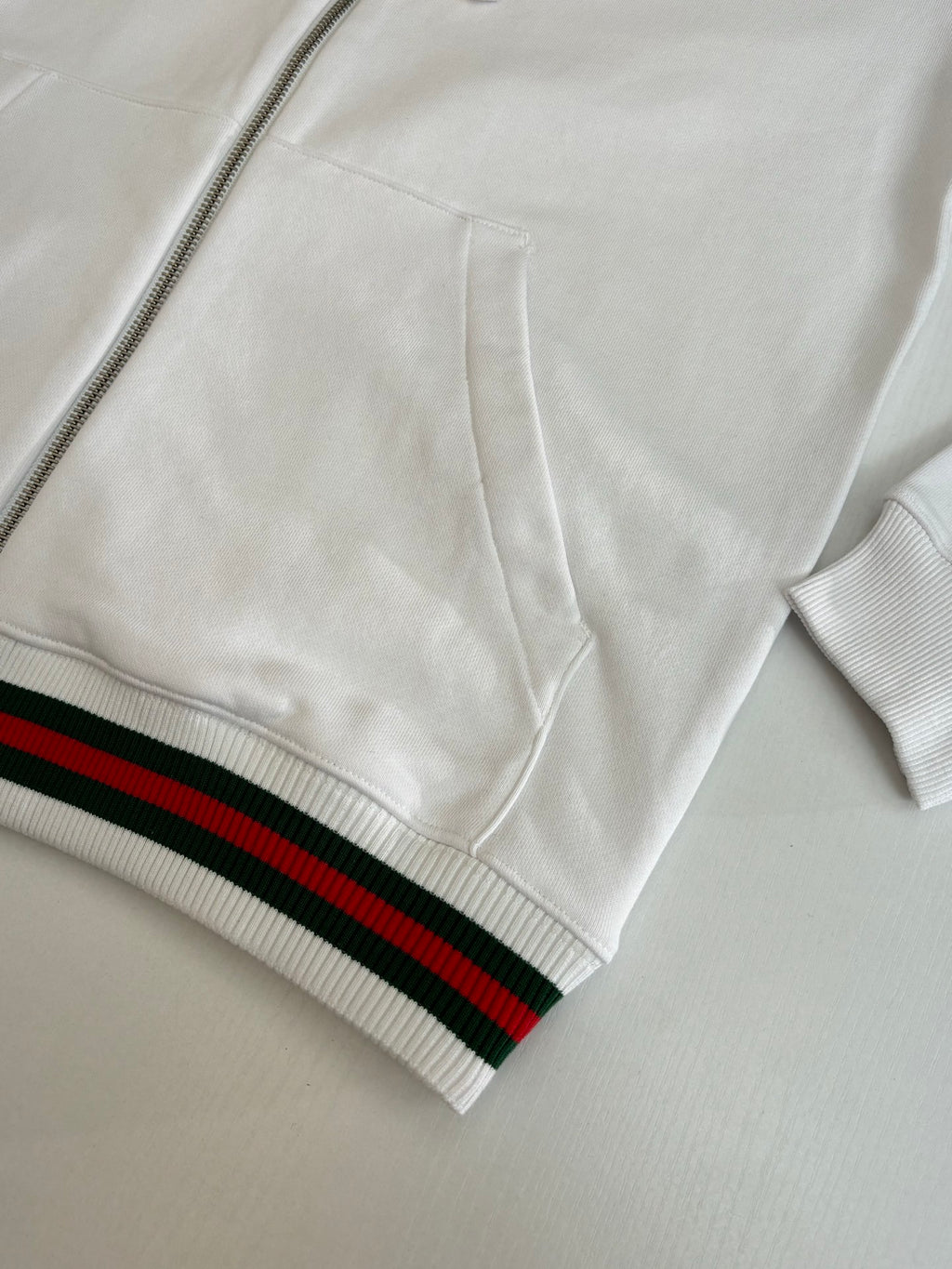 Gucci white zip hoodie sleeve cuff with green and red striped ribbing