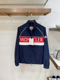 Navy zip-front jacket with white piping and red/white logo band