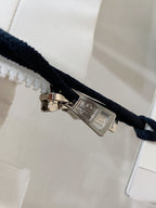 Long jacket snap closure with metal pull on dark drawcord