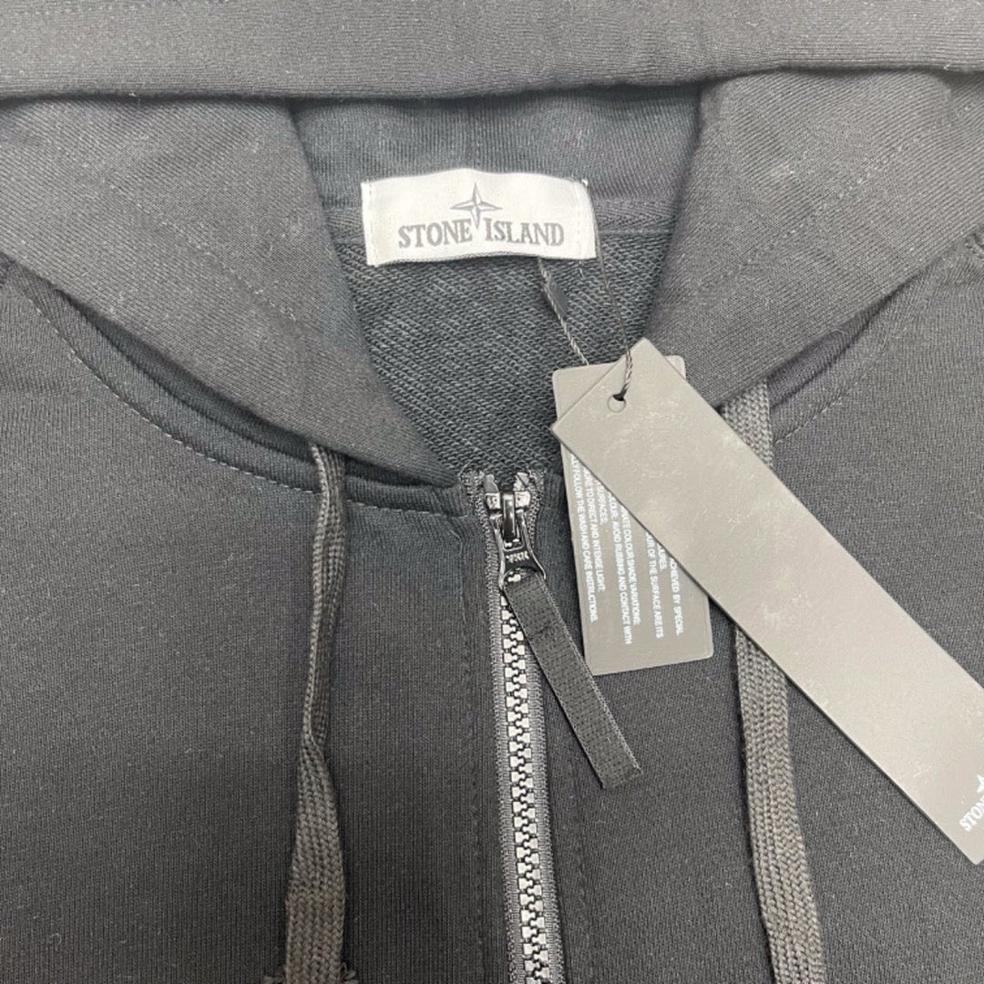 Stone Island zip-up hoodie neckline label and front zipper placket with tags