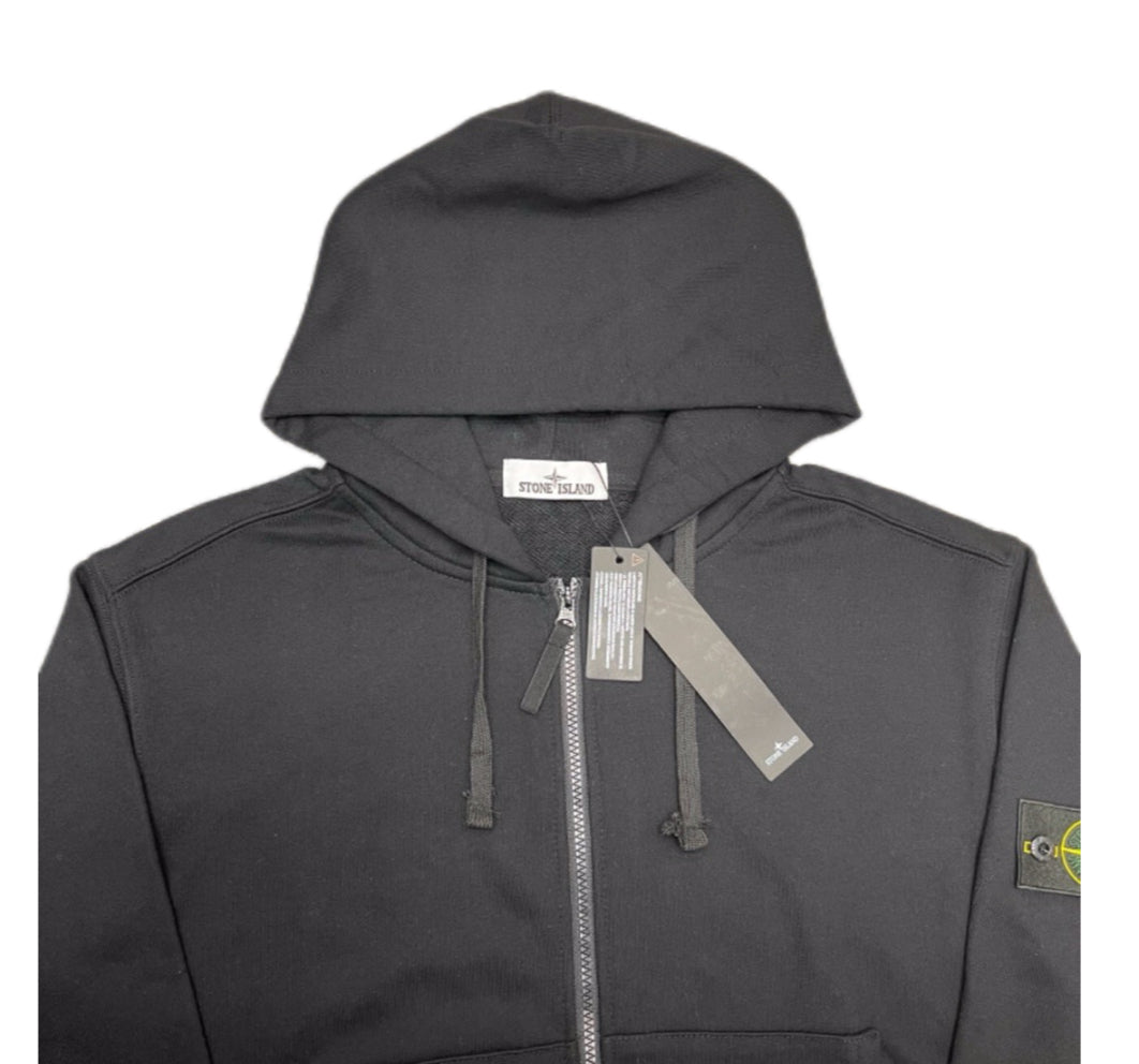 Stone Island zip-up hoodie hood with drawstrings and hanging fabric tags