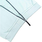 Stone Island light blue zip-up hoodie with black zipper and ribbed cuffs