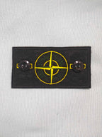 Stone Island light blue zip-up hoodie chest logo patch with yellow emblem