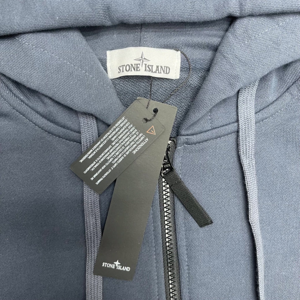 Stone Island hoodie neckline with hood lining and attached product tags