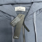 Stone Island hoodie neckline with hood lining and attached product tags