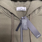 Olive hooded zip-up hoodie with Stone Island logo patch and hanging tags