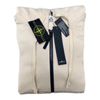 Stone Island light beige hoodie with full-zip front, drawstrings, and logo patch