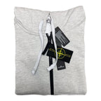 Stone Island zip hoodie in light gray marl, white drawstrings and black zip detail.