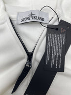 White Stone Island jacket with black zip and branded inner label