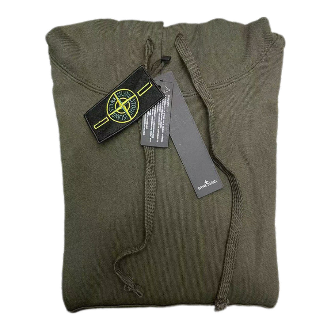 Stone Island olive hoodie folded flat with drawstrings and hanging brand tags
