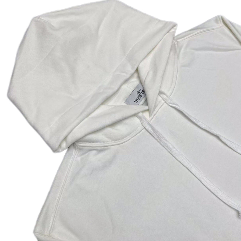 White Stone Island hoodie sleeve and chest seam with folded fabric, tags