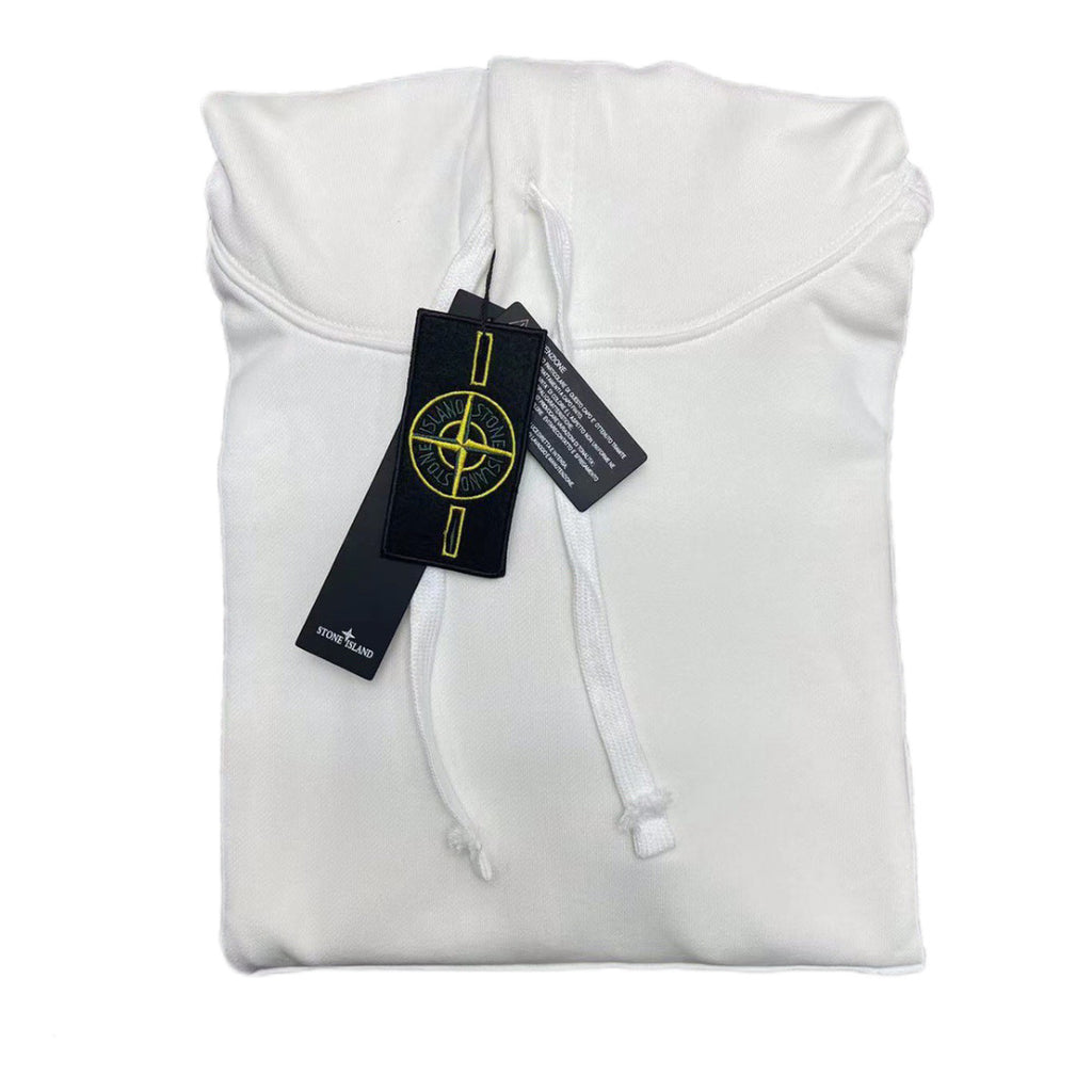 White Stone Island hoodie with drawstring hood and attached tag labels