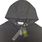 Gray hooded sweatshirt with hood snap buttons and brand patch at neckline