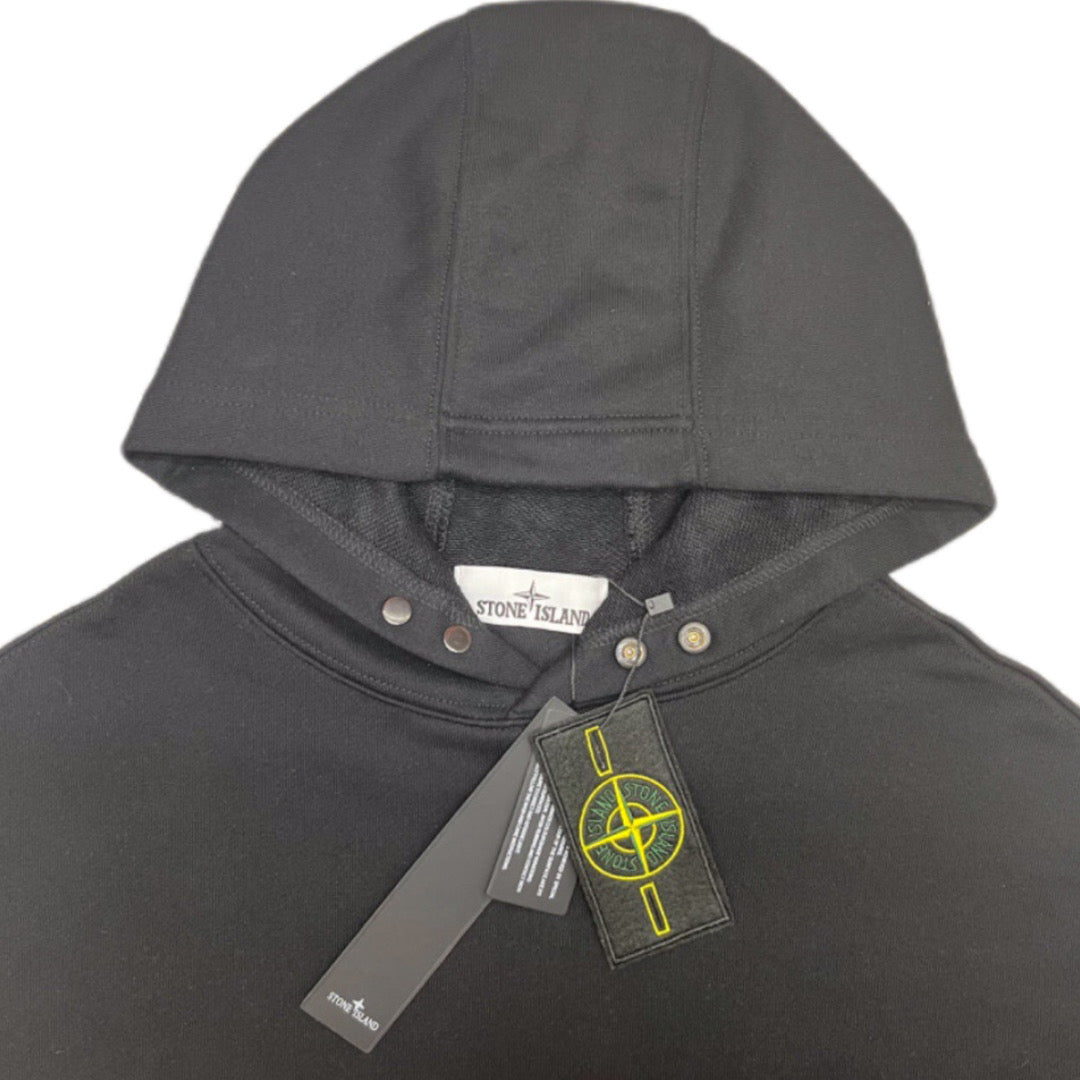 Gray hooded sweatshirt with hood snap buttons and brand patch at neckline