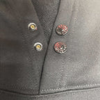 Gray ribbed collar with metal snap buttons on hooded sweatshirt