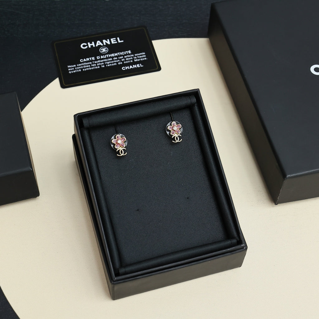 Pair of Chanel floral stud earrings in black gift box, pink stones, gold-tone CC