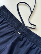 Navy shorts with adjustable drawstring and elastic waistband ruffle