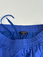 Blue shorts with elastic waistband and Louis Vuitton size label