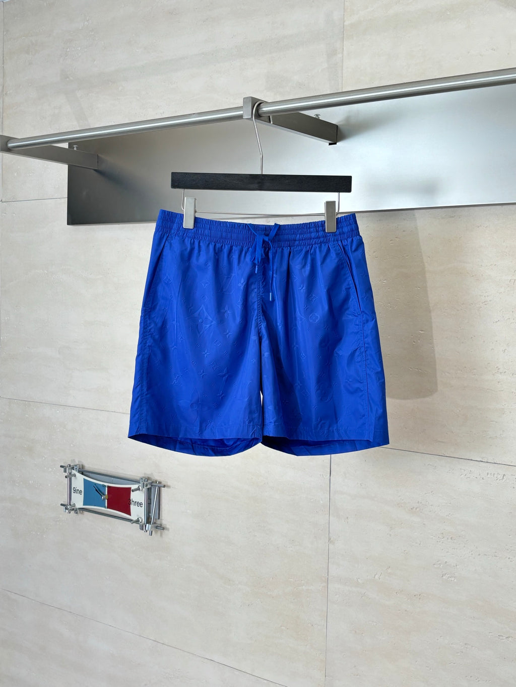 Blue Louis Vuitton shorts with elastic waistband and drawstring
