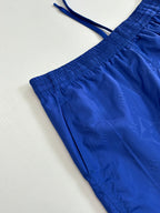 Blue shorts with gathered elastic waistband and embossed texture