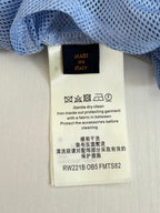 Pants care label tag attached to waistband