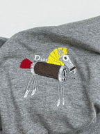 Grey T-shirt back with colorful cartoon graphic and heart patch