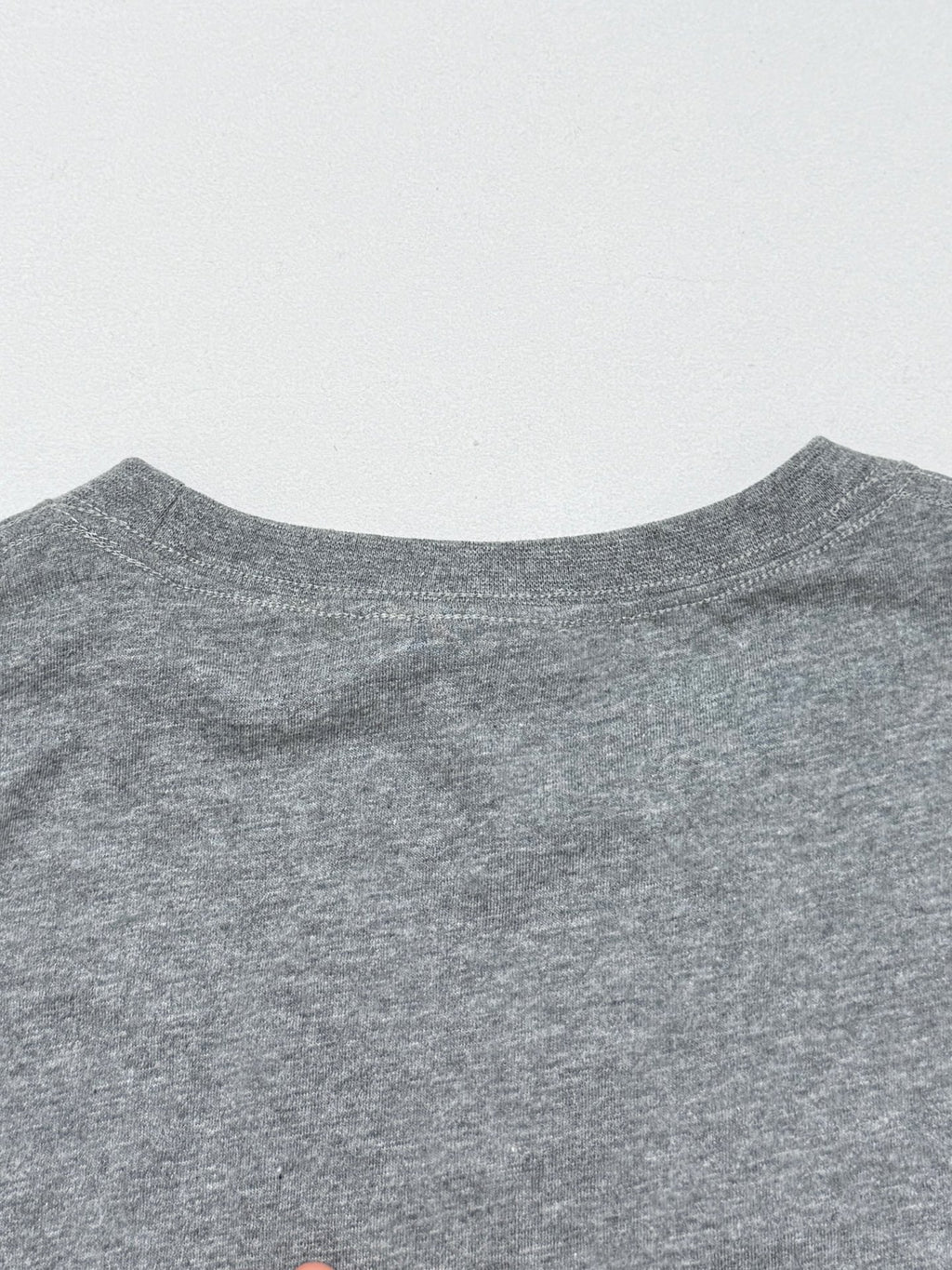 Grey T-shirt upper back with crew neckline