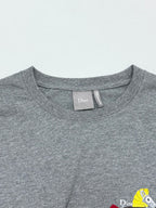 Grey crew-neck T-shirt collar with brand neck label