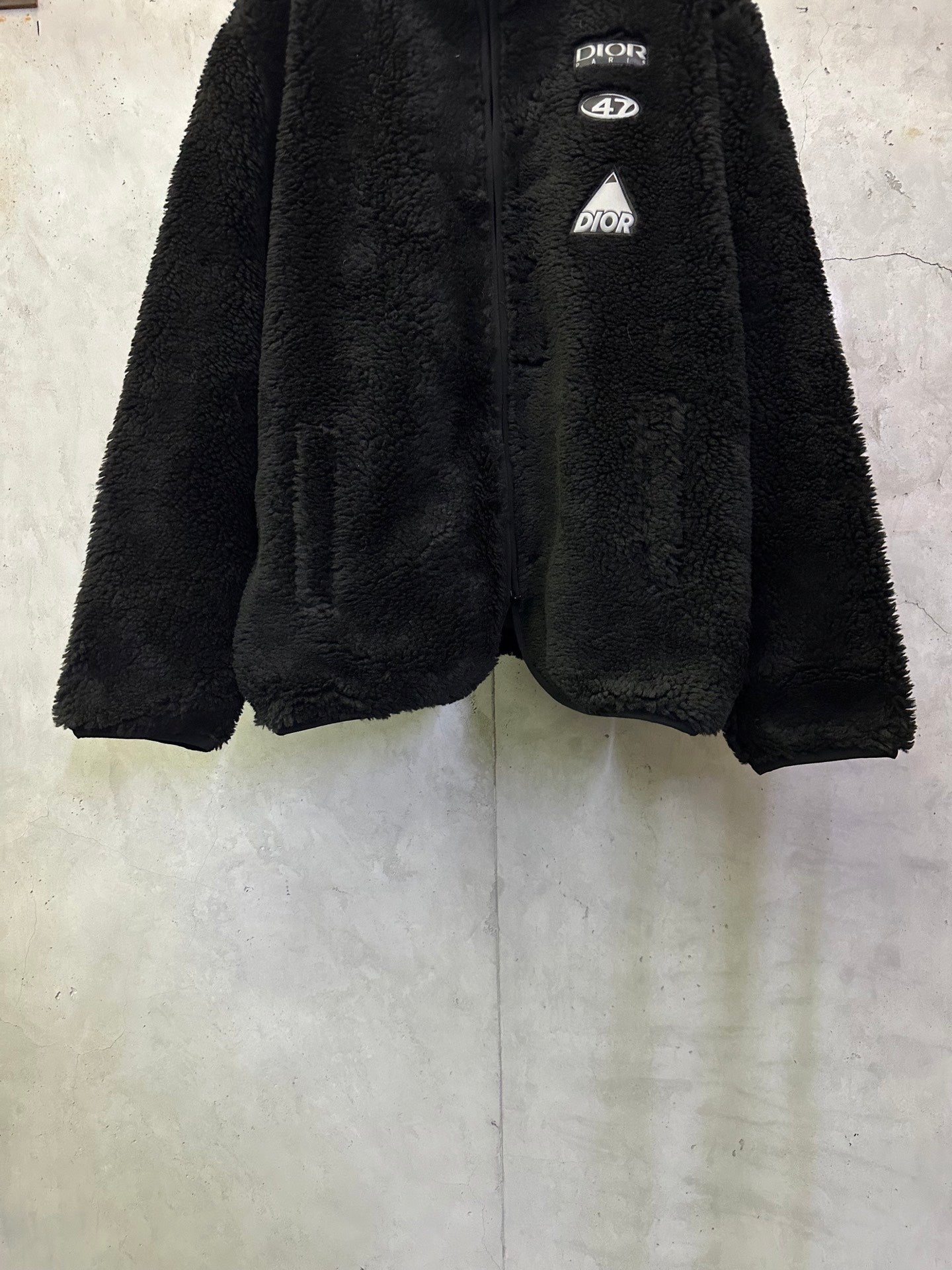 Dior long black fleece full-zip jacket, front view with zipper and logo