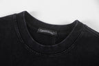 Black crew-neck short-sleeve T-shirt with interior brand label