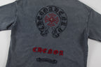 Charcoal short-sleeve T-shirt back with circular skull-and-flower and CHENOA text