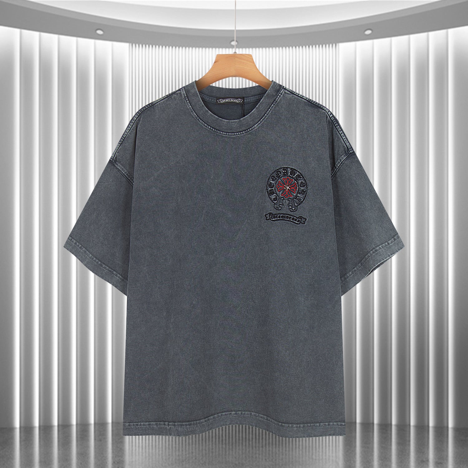 Dark gray short-sleeve T-shirt with small front chest logo graphic
