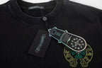Black crewneck T-shirt with neck label and graphic logo print