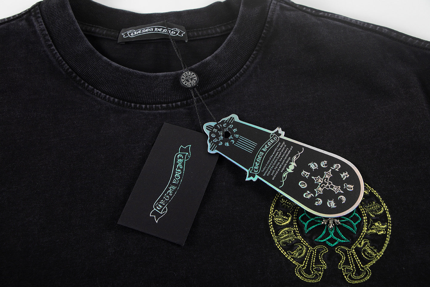 Black crewneck T-shirt with neck label and graphic logo print
