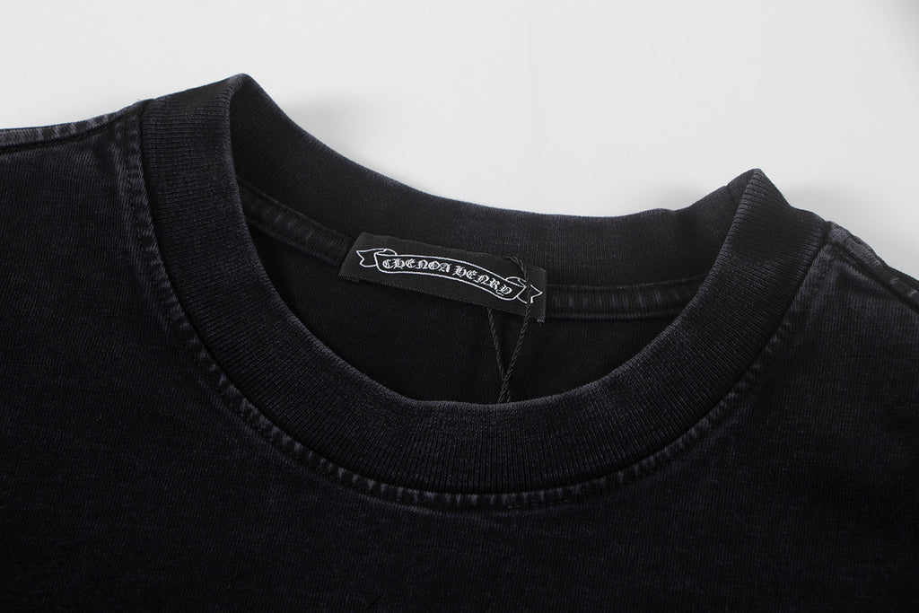 Black crewneck T-shirt with ribbed collar and brand neck tag