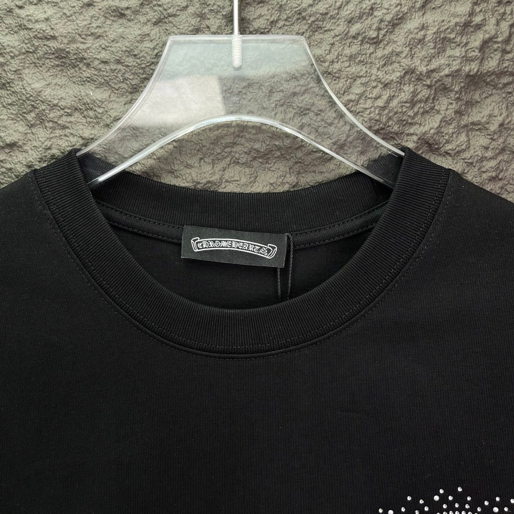 Black crew-neck T-shirt with ribbed collar and small logo label at neckline
