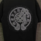 Black short-sleeve T-shirt with large rhinestone elephant graphic across back